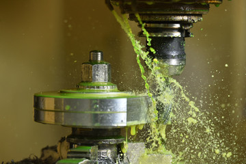 Spindle chuck and installed metal part in pocessing on high precision Cnc industrial lathe turning...