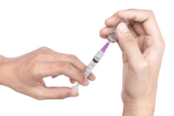 Doctor hand holding vials medication and injection needle isolated on white background. Medical doctor picking up medication into syringe.