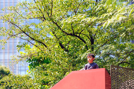 A boy playing in the park
