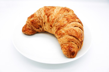 Bakery Croissant against a white background.