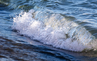 Waves on the seashore as an abstract background