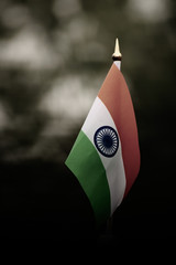 Tricolor national flag of India consists of Saffron white and green colours respectively with the Ashoka Chakra in the middle. 