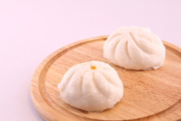 Steamed buns on the wooden floor.