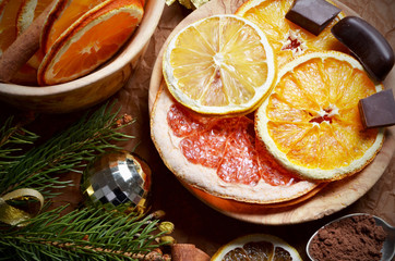 Slice of dried orange,lemon, grapefruit ,cinnamon sticks, chocolate