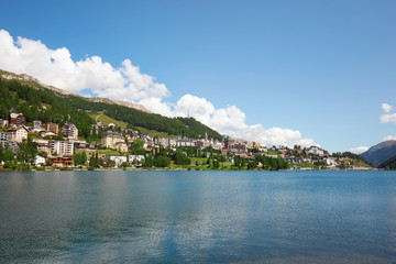 Fototapeta na wymiar Sankt Moritz town and lake in summer, sunlight in Switzerland