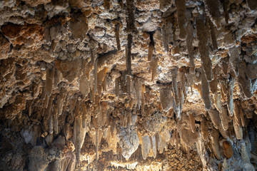 natural new stone stalagmite in cave