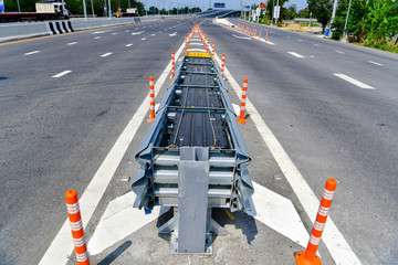 Crash Cushion on the road. Anchorless Non-Redirective Impact Attenuator.
