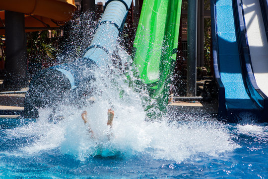 Colourful plastic slides in aquapark
