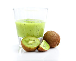 Smoothies of kiwi in glass with fresh fruits on white background