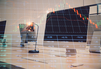 Double exposure of stock market chart and office desktop on background. financial strategy concept. 3d render