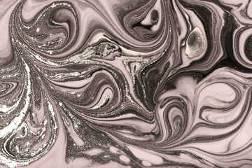 Gold marbling texture design. Pale marble pattern. Fluid art.