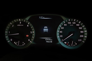 Speedometer dashboard of pickup truck.