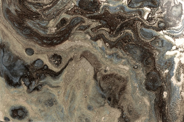 Gold marbling texture design. Pale marble pattern. Fluid art.