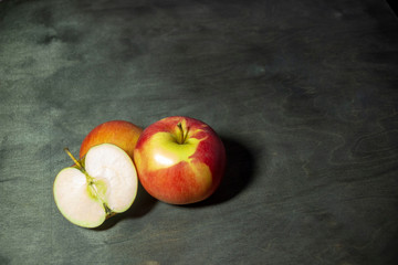 apples on a dark background