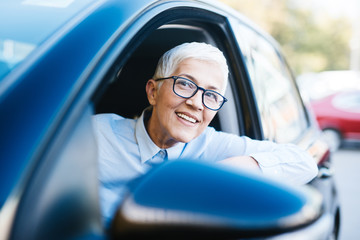 Mature women at car 