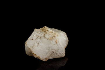 Macro mineral quartz stone on a black background