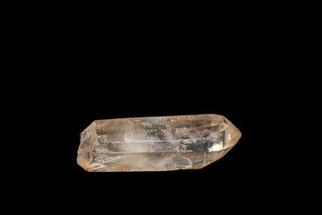 Macro mineral stone smoky quartz, rauchtopaz on a black background