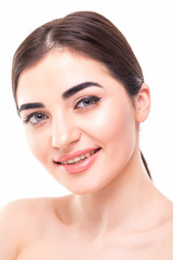 Obraz premium Beauty Woman Portrait. Professional Makeup for Brunette with Blue eyes - Lipstick, Smoky Eyes. Beautiful Fashion Model Girl. Perfect Skin. Make up isolated on a White Background. Part of face
