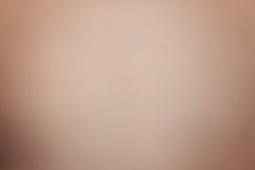 Light brown wall with a small vignette. Background