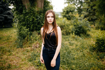 young girl posing on a street in the city