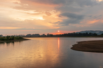 Naklejka premium Sunset on a lake in Hohenrode in Germany