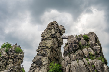 Sandstone rock formation Externsteine in Teutoburg Forest, Germany