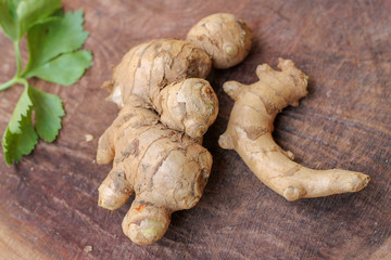 Ginger root  on wooden background