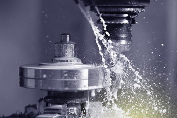 Spindle chuck and installed metal part in pocessing on high precision Cnc industrial lathe turning...