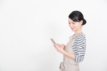 Naklejka premium エプロンの女性