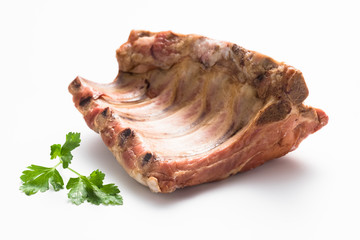 Smoked pork ribs on a white background.