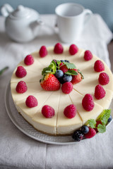 Fresh berry cheesecake, food photography, recipe idea for magazine