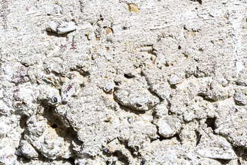 Texture of white  concrete wall. An old decrepid and uneven white wall lodge. Concrete texture. Cement  background.
