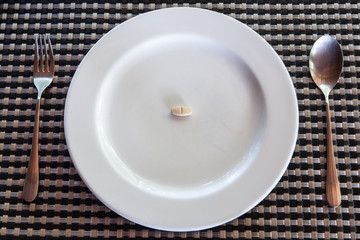 In white plate.have.supplementary food.One grain