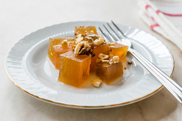 Turkish Crispy Pumpkin Dessert from Hatay / Kirecte Kabak Tatlisi with Walnut Powder.