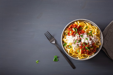 tagliatelle bolognese with herbs and parmesan, italian pasta
