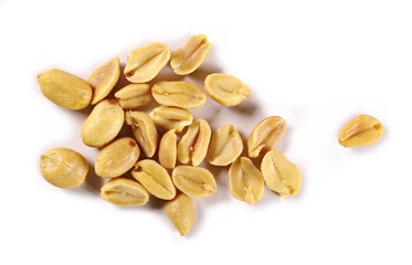 Salted and fried, roasted peanuts, pile isolated on white background, top view