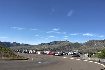 Car parking in the mountains looks like a sheep camp. Foothills of the volcano Saint Helens