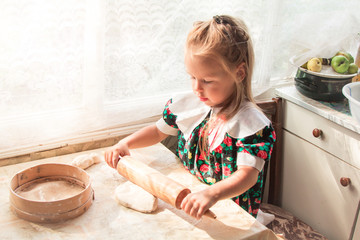  Little girl preparing the dough - 251556031