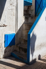 Fototapeta na wymiar Detail of the white and blue architecture, Morocco