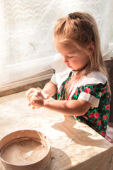  Little girl preparing the dough - 251556069
