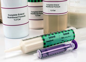 Team of enteral nutrition prepared in hospital, palliative care, conceptual image, horizontal composition