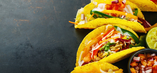 Tasty appetizing tacos with vegetables