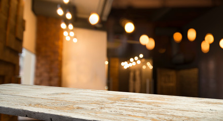 Beer barrel with beer glasses on a wooden table. The dark brown background.