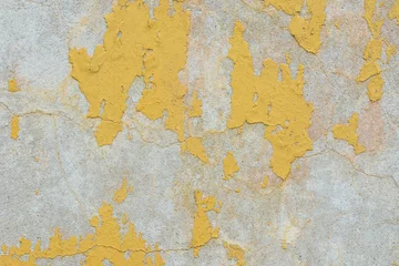 Wall murals Old dirty textured wall old peeling yellow  painted  wall texture background