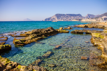 Ancient roman ruins, Banos de la Reina, the Baths of the Queen in Calpe beach, Spain