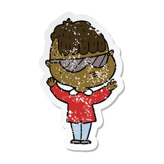 distressed sticker of a cartoon boy wearing sunglasses