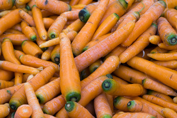 As shot fresh carrots photo at market place