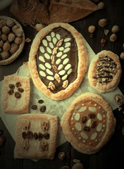 Mazurek traditional polish easter cake on wooden background, close up vintage view