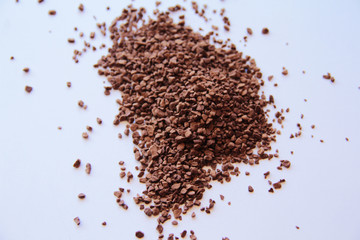 Coffee granules on a light background