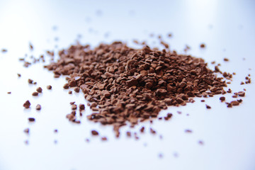 Coffee granules on a light background